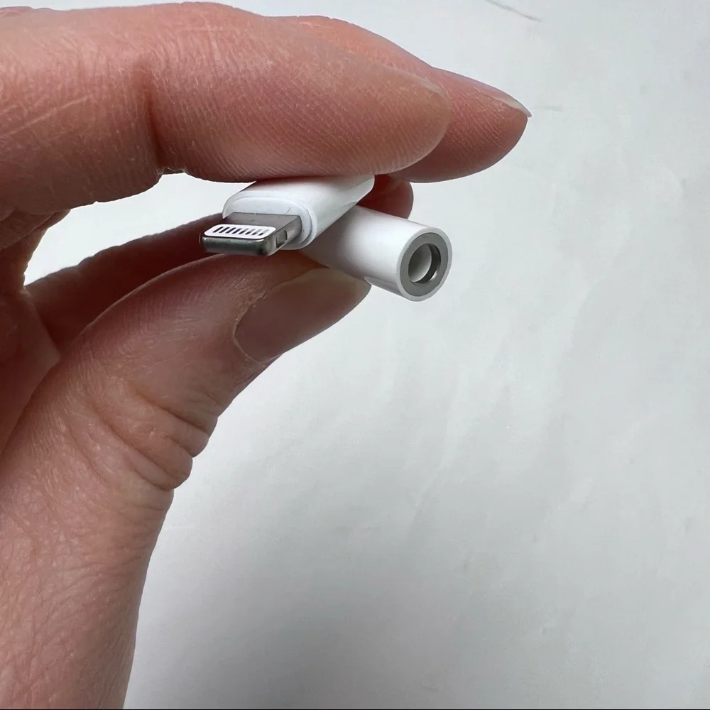 Never Used - Apple Adapter - 3.5mm headphone jack to lightning port adapter